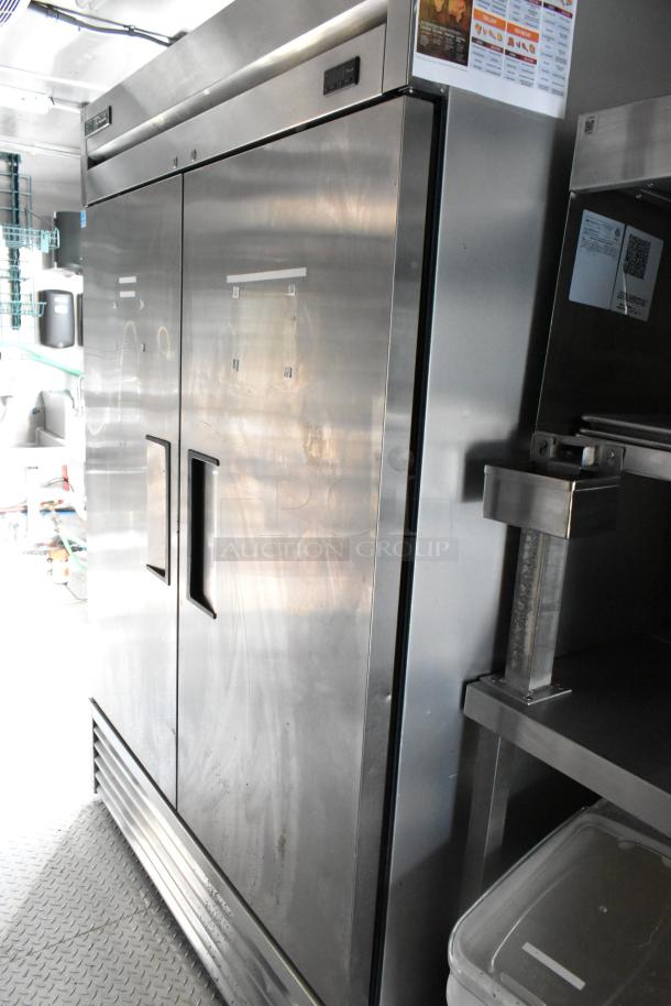 Fully outfitted food trailer with stainless steel double-door refrigerator, ready for opening day. Clean condition.