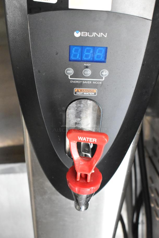 Bunn hot water dispenser with red tap, energy saver mode, and temperature control. In good condition, ready for use.