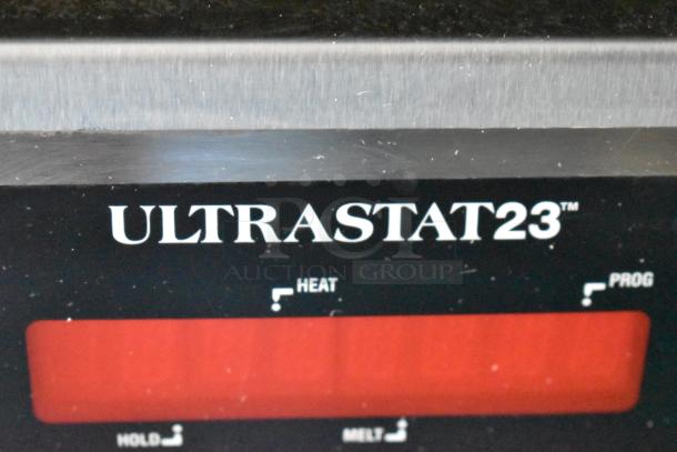 "ULTRASTAT23 control panel; features heat, hold, and program options, indicating advanced temperature management capabilities."