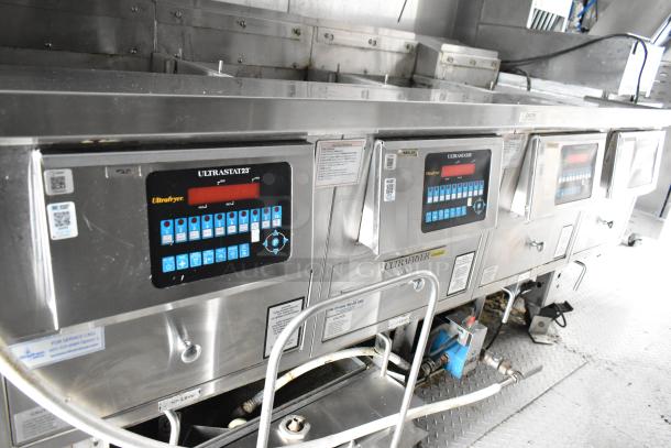 Fully outfitted food trailer with Ultrafryer cooking units, Ultrastat23 controls visible. Clean, ready for opening day.