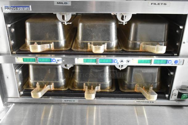 Food trailer appliance, Prince Castle brand, dual-level warmer for items labeled mild, spicy, filets, nuggets, good condition.