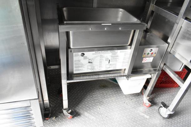 Food trailer interior with AyrKing breader/blender/sifter, stainless steel, control panel visible, in excellent condition.