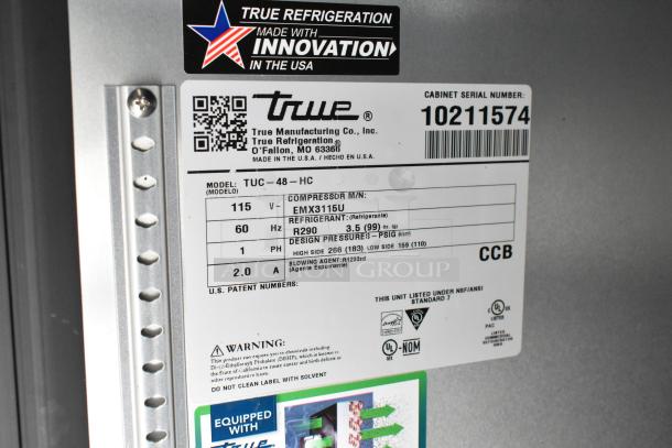 "True TUC-48-HC refrigerator label, 115V, R290 refrigerant, compressor EMX3115U. Serial number 10211574, made in USA."