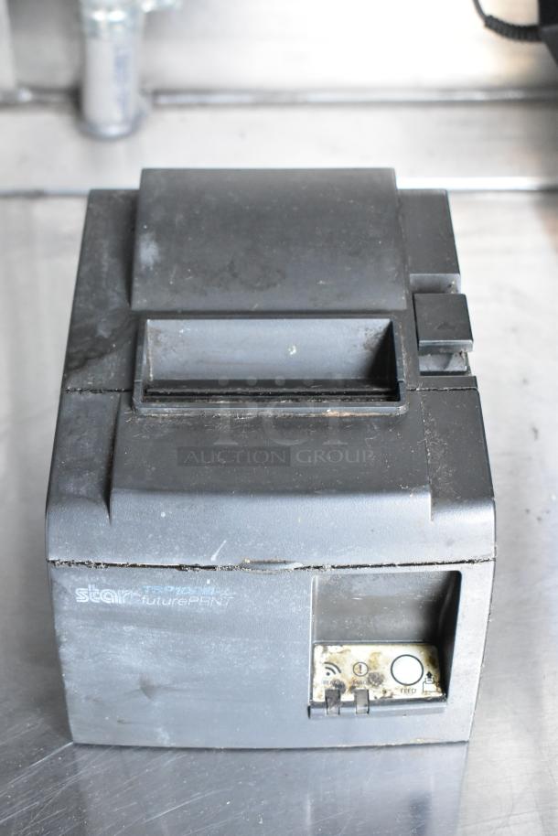 Star TSP700II futurePRNT receipt printer, black, signs of wear, front control panel with buttons and label.