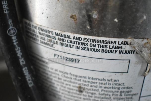 Close-up of SDG Trailers appliance label showing model number F71123917 and safety warnings.