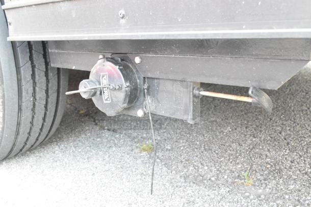 SDG Trailers trailer detail showing suspension system with Vibra brand component. Appears in used condition.