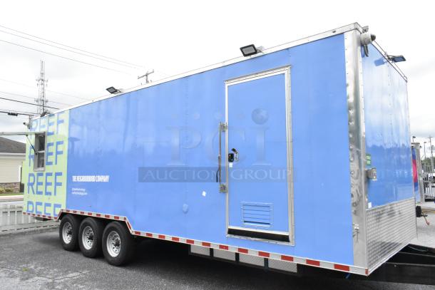Blue Reef food trailer, fully outfitted, triple axle, ready for use. Markings include “REEF” and “The Neighborhood Company.”