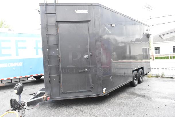 2020 Southern Dimensions Group trailer, GVWR 6,350 KG/14,000 LB, black exterior, dual axle, ladder attached, side door.