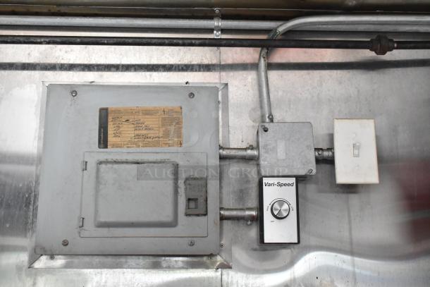 Electrical panel with labeled diagram, Vari-Speed dial, and switch in a food trailer. Good condition. Key features for operation.
