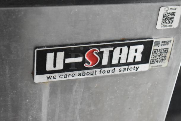 U-Star appliance label reading "we care about food safety" on food trailer, showcasing U-Star's safety commitment.
