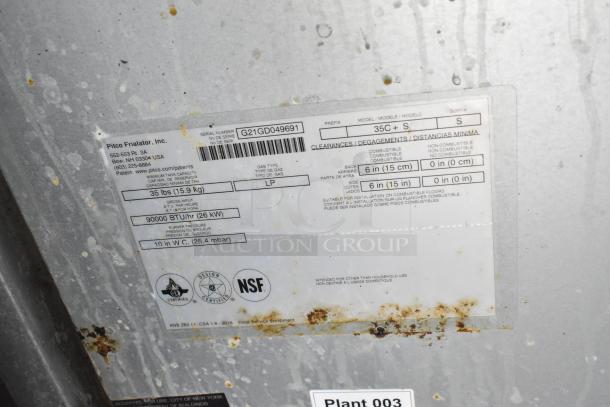 Pitco Frialator label on metal surface with serial number G21GD049691, indicating 35 lbs capacity, 90,000 BTU/hr.