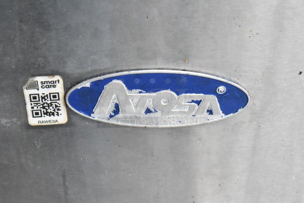 Atosa logo with Smart Care QR code on a metal surface, indicating appliance brand and service information.