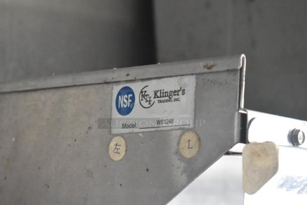 NSF-certified Klinger’s Trading Inc. model WS1248 label on a metal fixture of a food trailer.