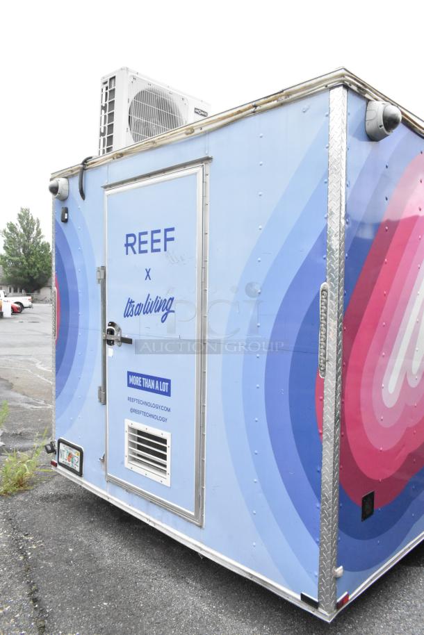 Fully outfitted REEF food trailer with vibrant blue and pink branding. Ready for opening day, includes appliances and fixtures.