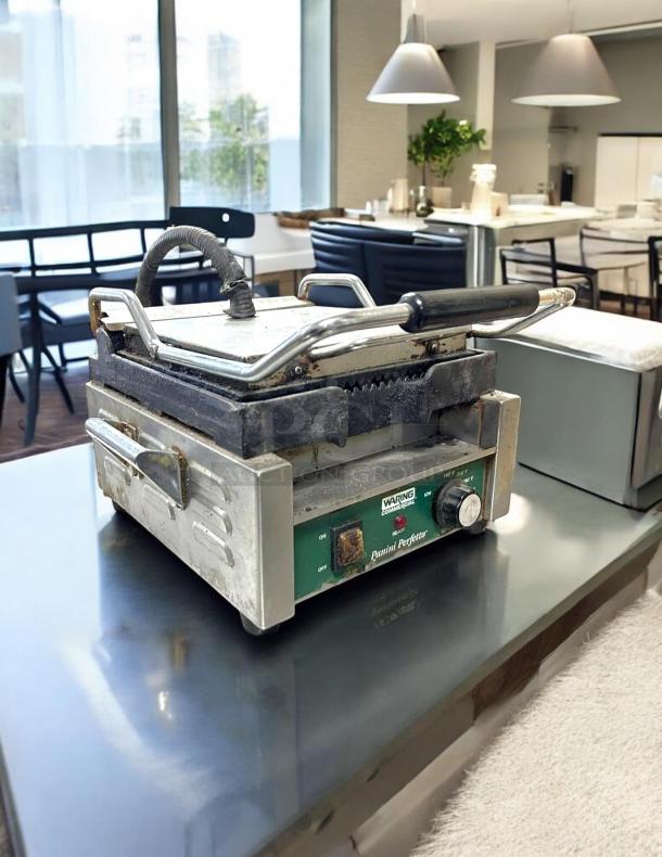 Waring WPG-150 Panini Grill in superb condition, 120V, fully tested and operational, visible Waring label and controls.