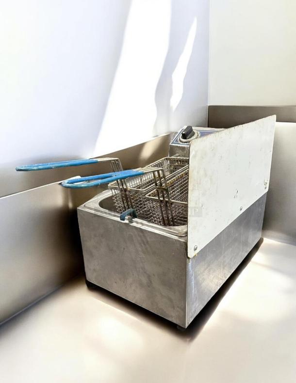 Globe PF-10E stainless steel electric countertop fryer, 10 lb, excellent condition, tested, dual basket, lightly duty use.