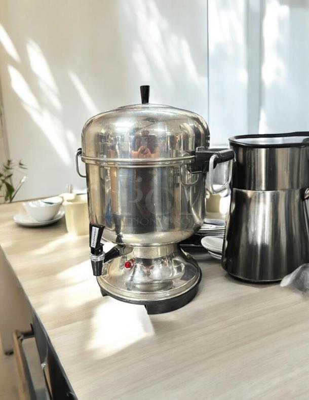 Farberware Electric Percolator Urn, Model L-1360, stainless steel, 36-cup capacity, excellent condition, tested working.