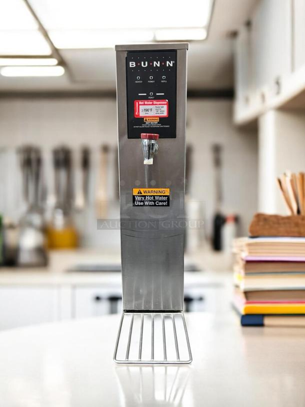 Bunn H5X-40-208 hot water dispenser, stainless steel, tested, excellent condition, with warning labels on usage.