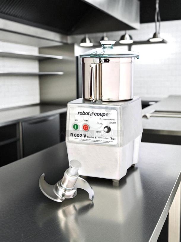 Robot Coupe R-602-V Series E food processor, great condition, features 7 qt. bowl, visible control panel, fully tested.