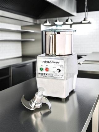 Robot Coupe R-602-V Series E food processor, great condition, features 7 qt. bowl, visible control panel, fully tested.