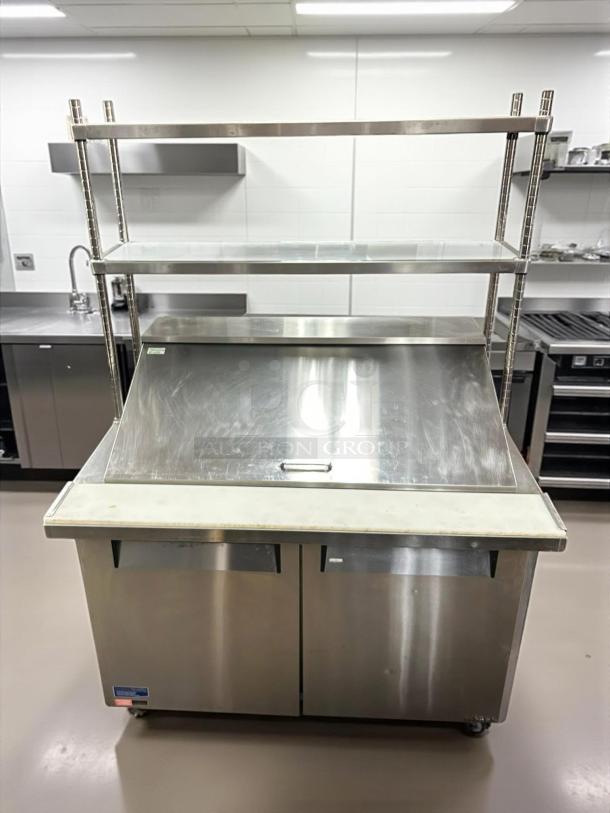 Turbo Air MST-48-18-N prep table refrigerator in excellent condition, with two sections, mega top, and overshelf, fully tested.
