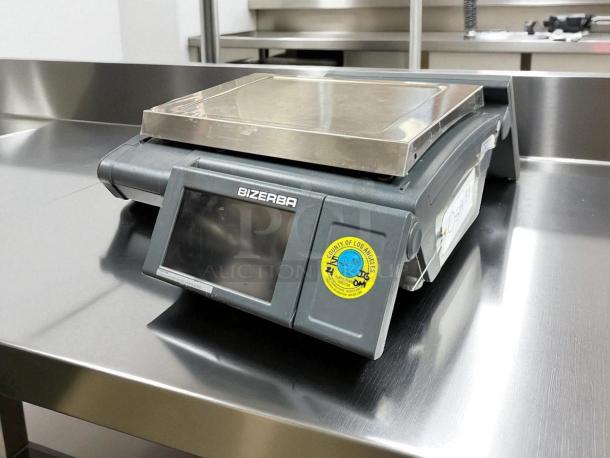 Bizerba KH II 100 Pro 30 lb computing scale in excellent condition, touchscreen, and Los Angeles County inspection sticker.