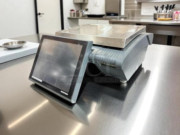 Bizerba KH II 100 PRO 30 lb. computing scale in excellent condition, features sleek touchscreen and sturdy platform.