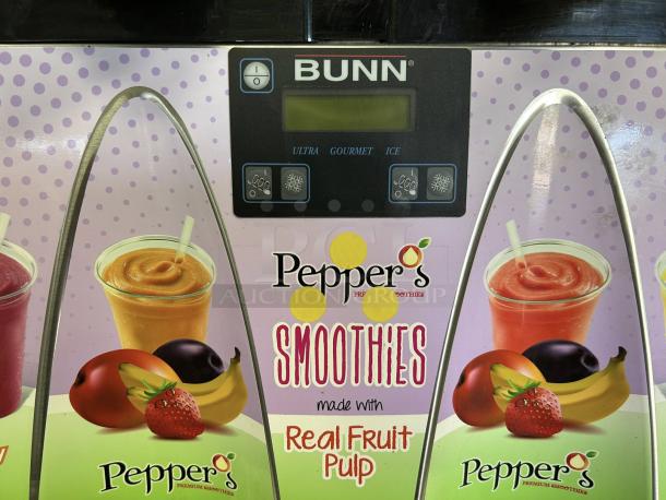 Bunn Ultra-2 model 34000.0522 frozen beverage machine, fully tested, with autofill, featuring a colorful smoothie display.