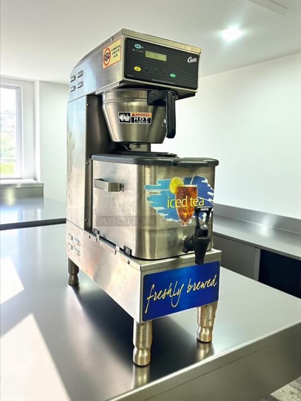 Curtis TBP 3 gal low profile brewer, digital programming, great condition. Visible warning and brand labels. Fully tested, 120v.