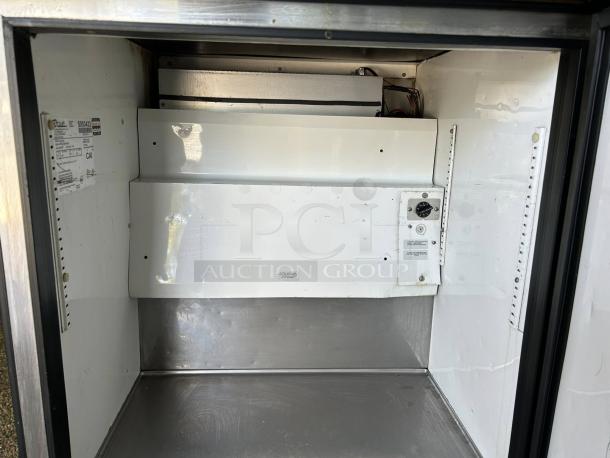 True TWT-27F Work Top Freezer, amazing condition, interior view, tested and working, visible label with model details.