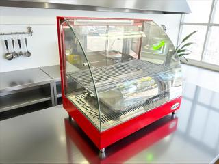 Cozoc FW5004-2 curved food warmer in excellent condition; 1200 Watts, 120V/60HZ, red casing, fully tested and working.