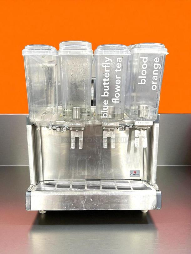 Crathco CS-4E-16-290 refrigerated drink dispenser with four 2.4-gallon bowls, labels "blue butterfly" and "blood orange," fully tested.
