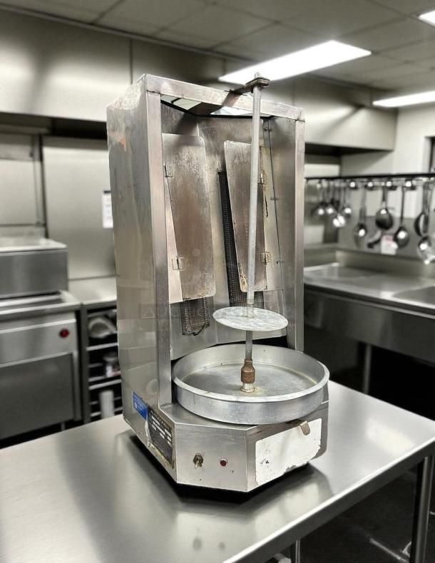 Optimal Automatics Autodoner 3-PG gas vertical broiler, 65 lb capacity, 120v, stainless steel, fully tested, excellent condition.