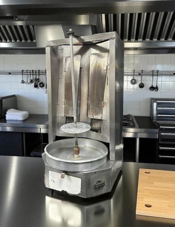 Autodoner 3-PG gas vertical broiler, 65 lb capacity, fully tested, working condition, stainless steel finish.