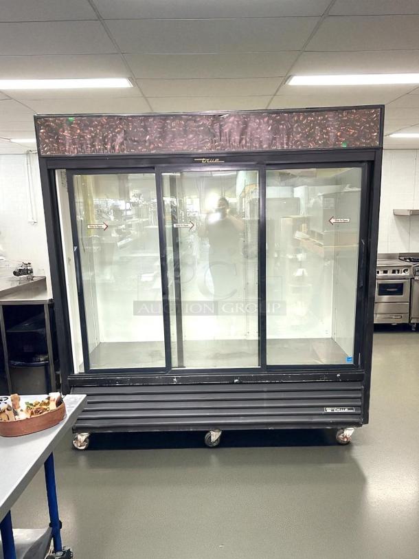 True GDM-69 black refrigerated glass door merchandiser, 78 1/8", excellent condition, fully tested, sliding doors.