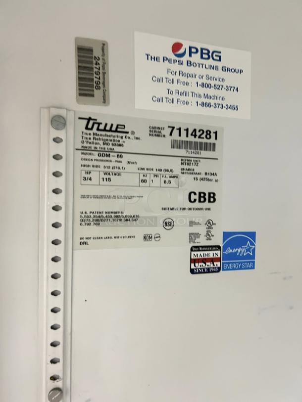 True GDM-69 merchandiser label, showing model and serial numbers, Energy Star certification, and service details.
