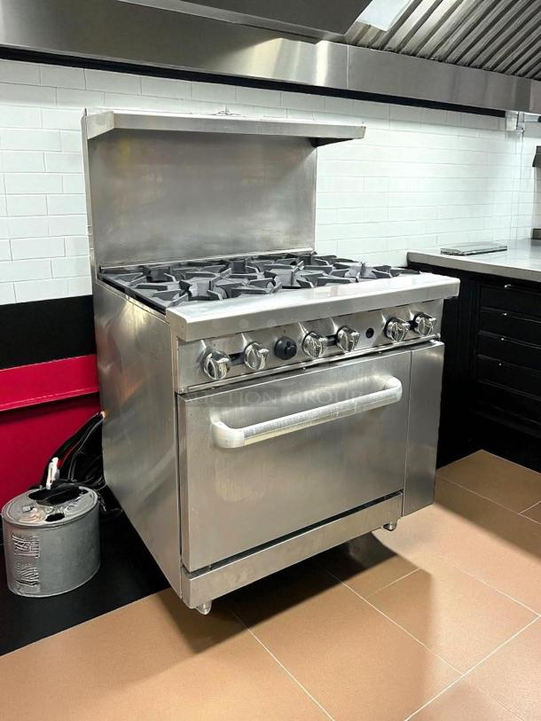 Atosa AGR-6B CookRite 36" gas range with six 32,000 BTU burners and oven. Stainless steel, fully tested, excellent condition.