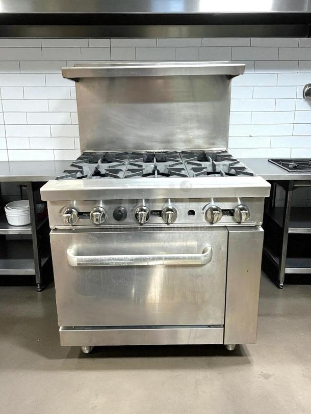 Atosa AGR-6B gas range with 6 burners, 36" width, 32,000 BTU, and oven. Stainless steel, excellent condition, fully tested.
