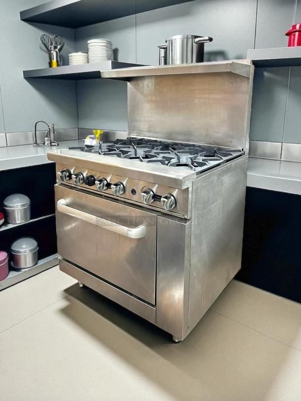 Atosa AGR-6B gas range, 36", six 32,000 BTU burners, oven, excellent condition, fully tested, stainless steel.