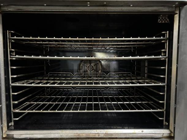 Southbend KLGS/27SC double gas convection oven, 53,000 BTU, excellent condition, four racks, fully tested and working.