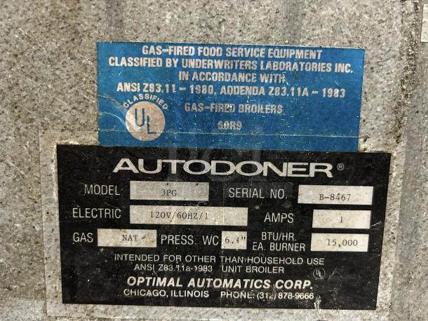 Optimal Automatics Autodoner 3-PG tag showing model, serial no. B-8467, 120V, 15,000 BTU/hr, UL classified.