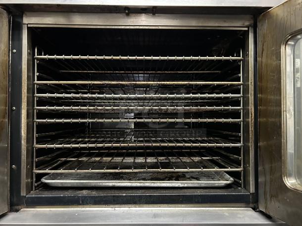 Montague 2-115A Vectaire convection oven, natural gas, 2 decks, excellent condition, fully tested, stainless steel interior.