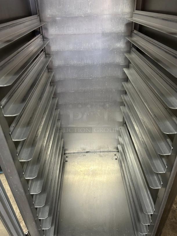 Lakewood Aluminum CA72-RR18-S-R bakery sheet pan rack in excellent condition, with multiple slots for bread holding.