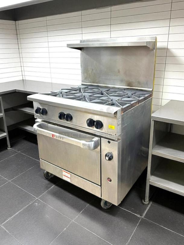 Wolf Commercial WX36-6B gas range, 36", six 28 KBTU burners, stainless steel, excellent condition, fully tested, lower oven.