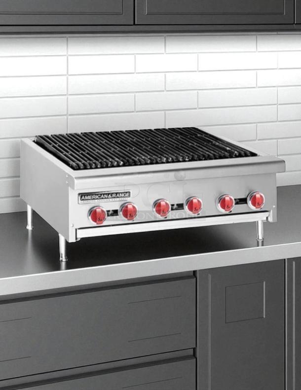 New in box American Range AERB-36 gas charbroiler, 36" wide with 6 burners, stainless steel finish, red knobs.