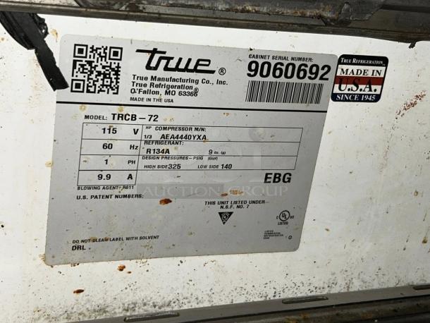 True TRCB-72 refrigerated chef base label detailing 115V, 60Hz, R134A refrigerant. Made in USA. Serial number 9060692.