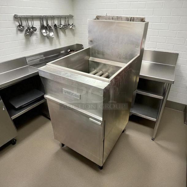 Vulcan LG400 gas fryer, 50 lb vat, floor model, natural gas. Stainless steel, tested and working. Excellent condition.