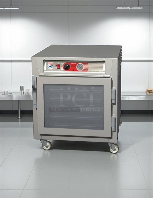 Metro C563L-SFC-L under-counter heated holding cabinet with clear doors, 120V, tested and working, push cart design.