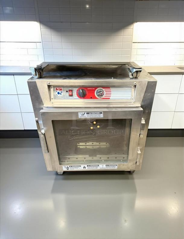 Metro C563L-SFC-L C5 Series heated holding cabinet, under counter, clear door, tested working, 120V 1PH, visible controls.