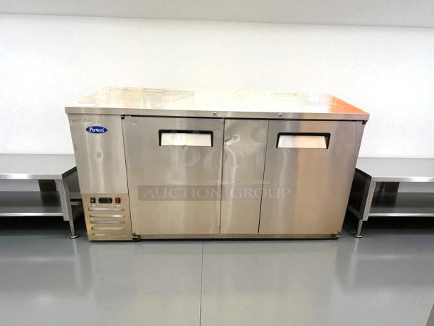 Atosa Model MBB69GR back bar cooler, 68", 21.5 cu. ft., solid doors, excellent condition, tested and working.